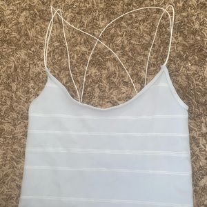 Blue and white striped. tank with thin straps!